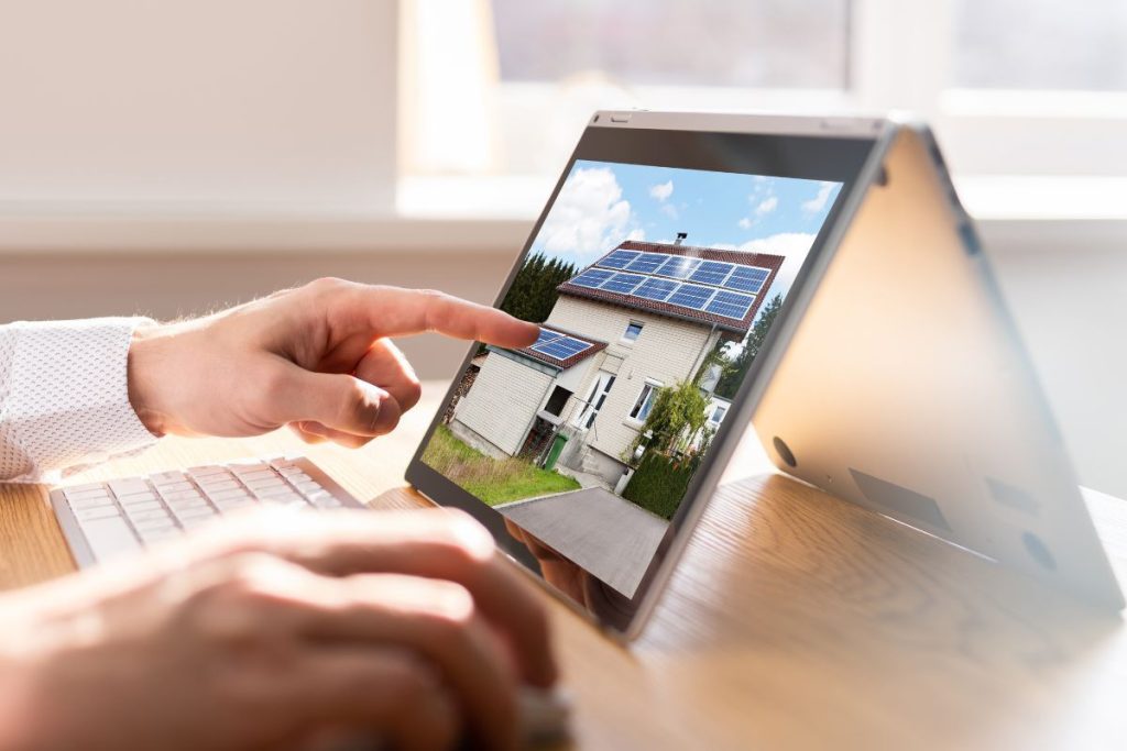 Property image being reviewed on a touchscreen for real estate photo editing pricing